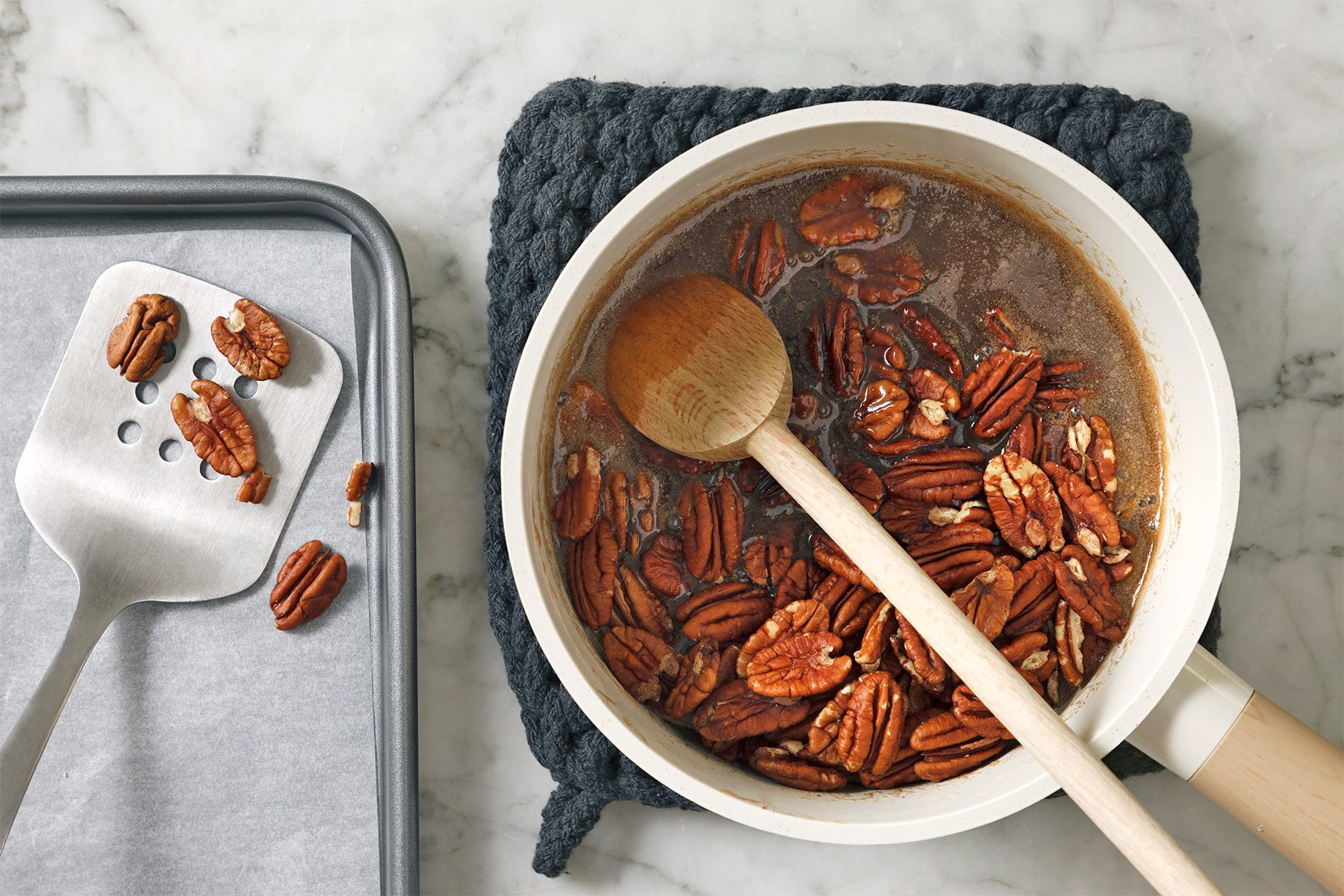 cook pecans in a large saucepan