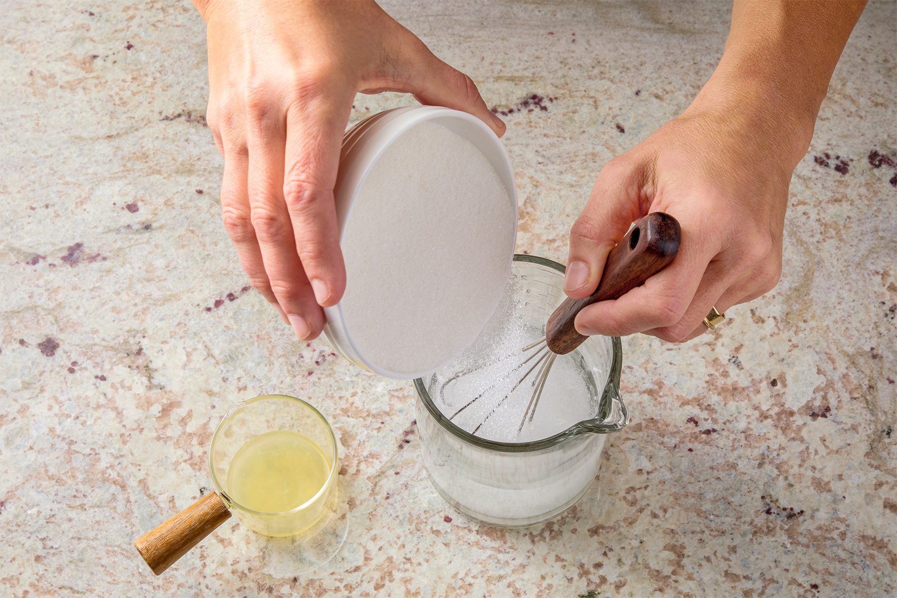 In a medium bowl, whisk together milk, eggs, sugar and extracts until combined.