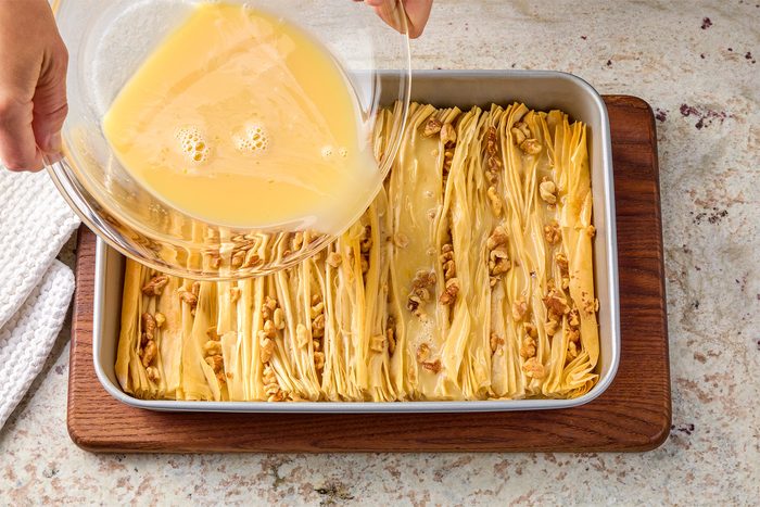 Pour custard mixture over phyllo