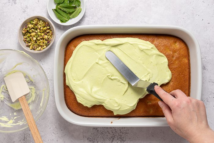 Frosting Spread On Pistachio Cake