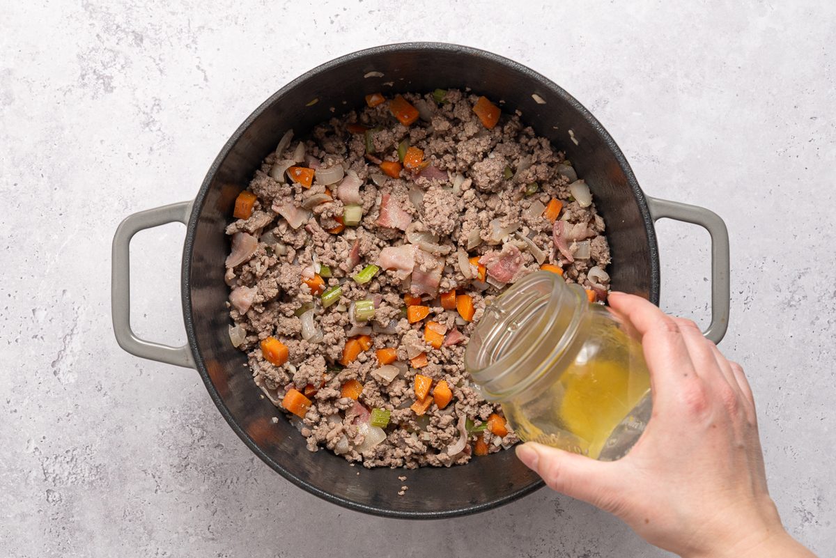 Broth Added To Meat And Vegetables Mixture
