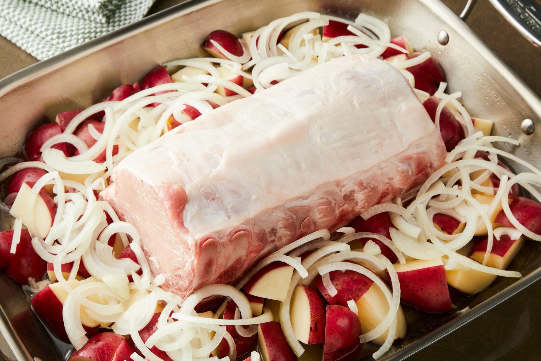 3/4th shot of potatoes and onions around the roast