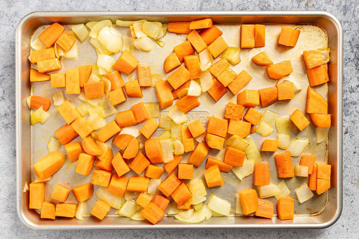 Taste of Home Sheet Pan Kielbasa and Veggies photo of the roasted root veggies on a sheet pan.