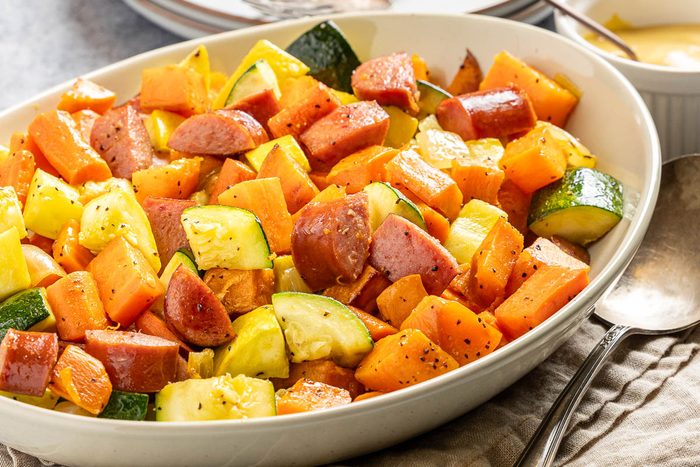 Taste of Home Sheet Pan Kielbasa and Veggies photo of the finished recipe in a serving dish.