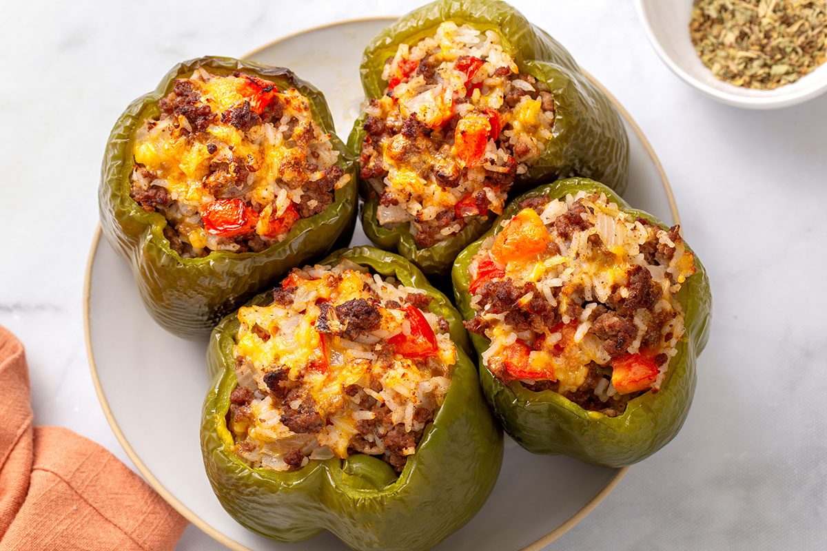 Stuffed Peppers with Cheese on a serving platter for Taste of Home