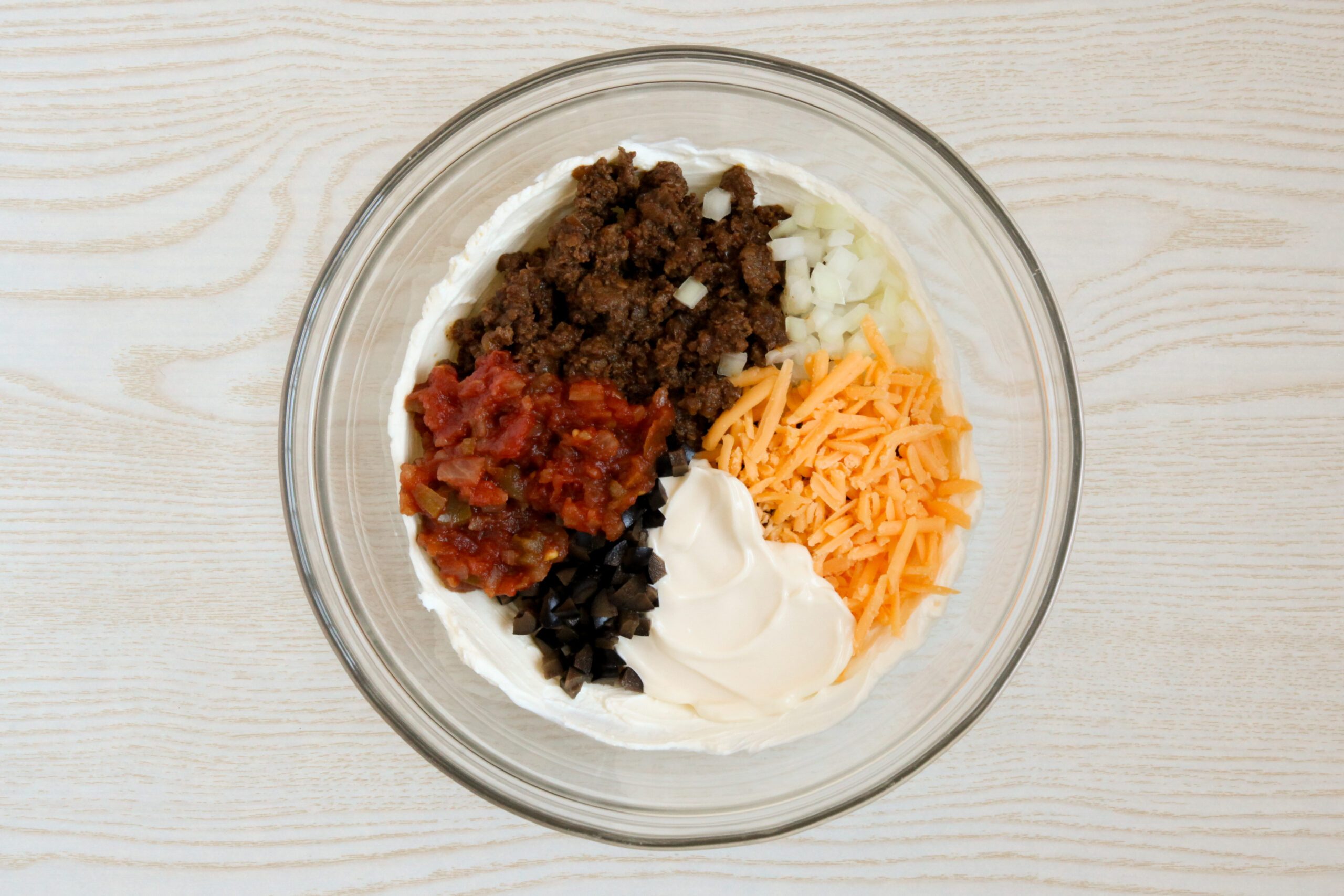 Mixing taco pinwheel filling