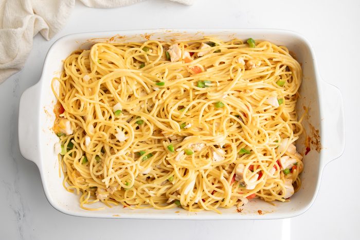Overhead shot for Taste of Home Turkey Tetrazzini with Cream of Mushroom Soup, ingredients in a large baking dish after baking.