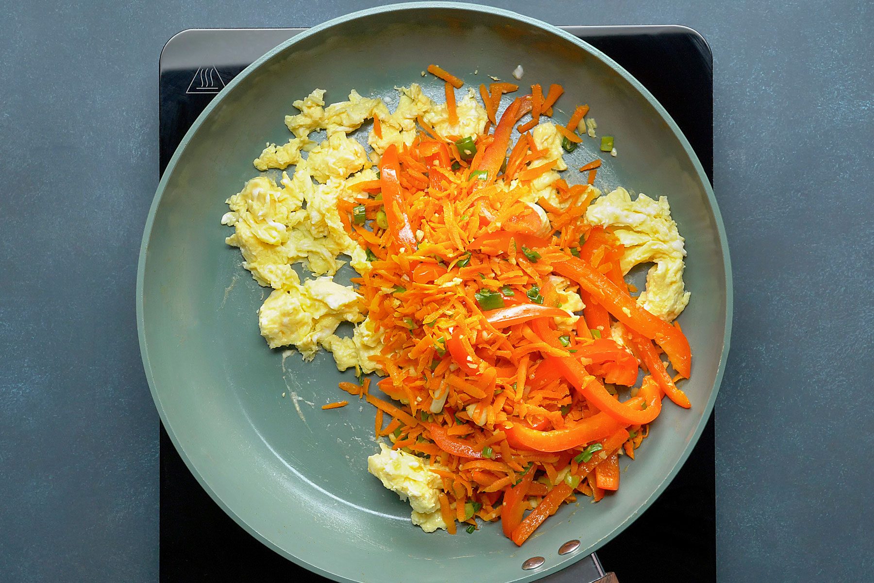 green onions and garlic stir fried with carrots
