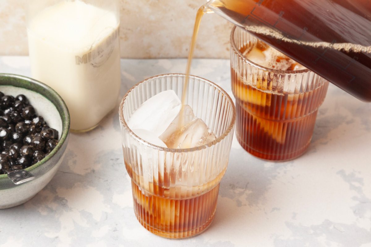 tea being poured over ice