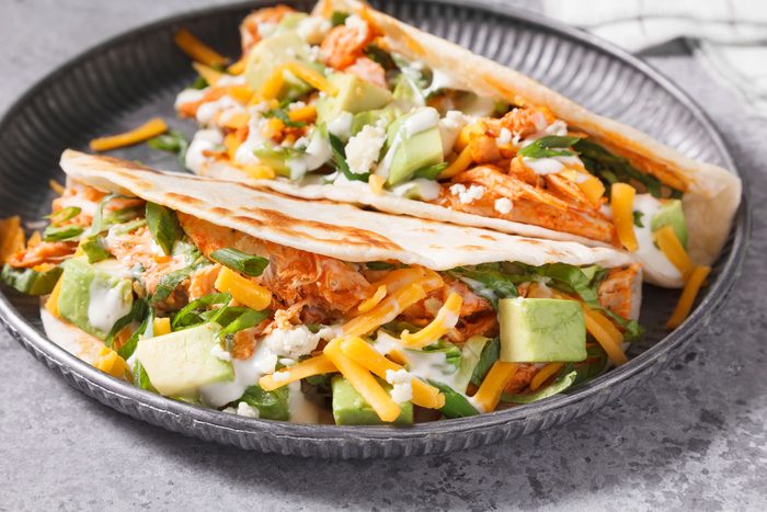 Two Buffalo Chicken Tacos served in a plate