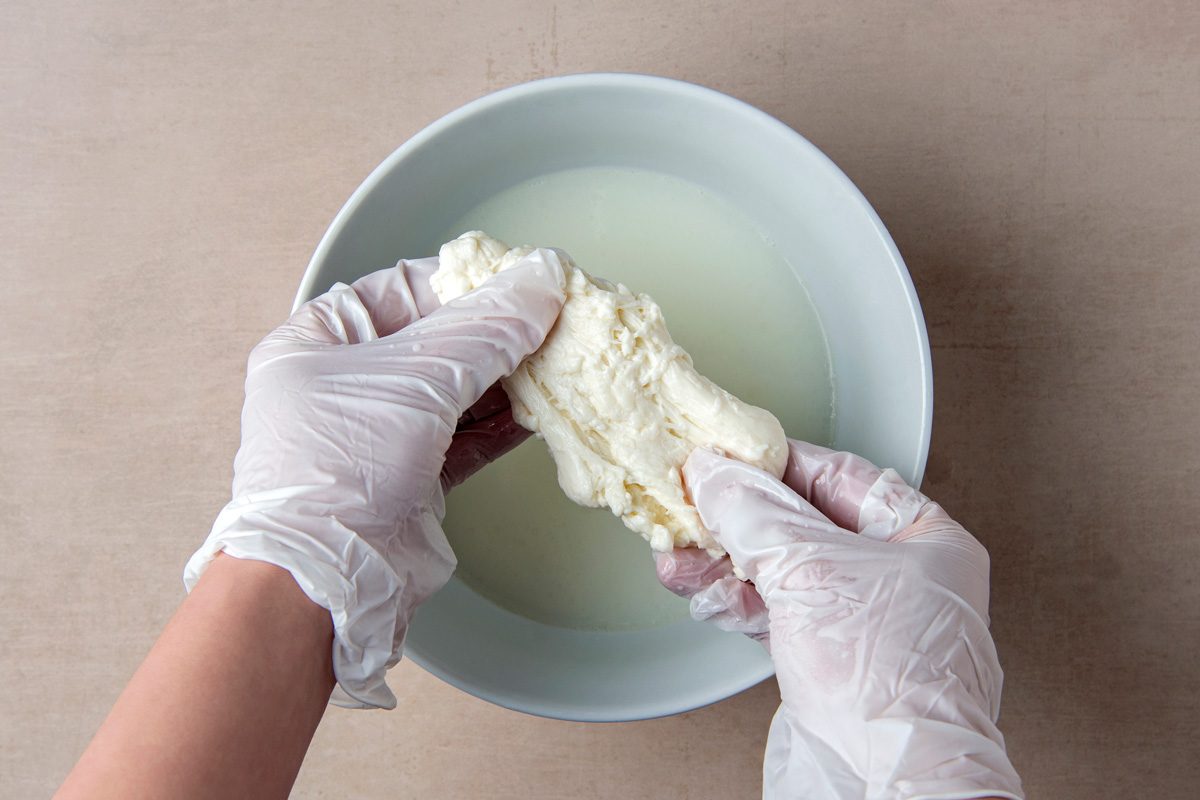 solidified curd being streched