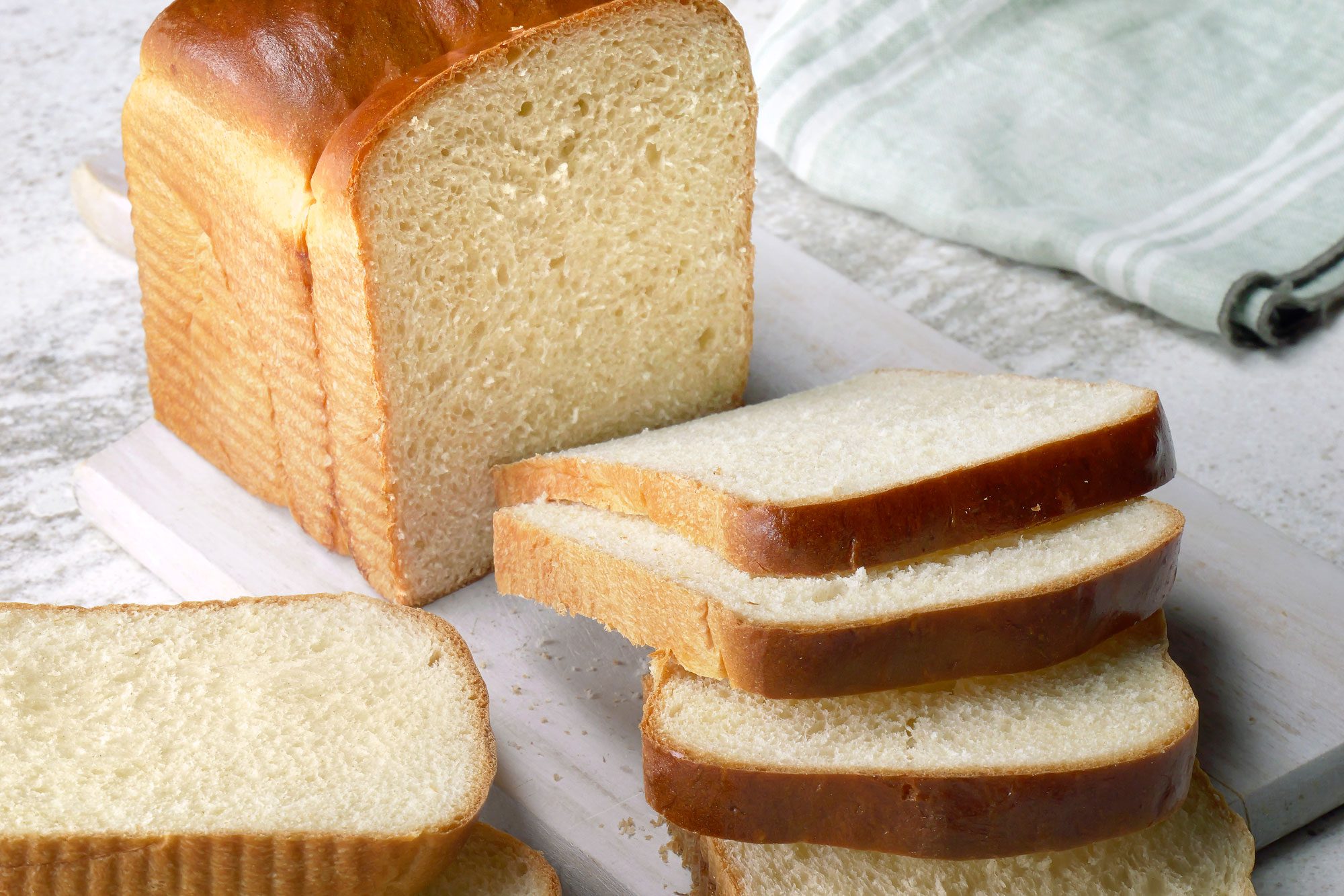 Japanese Milk Bread sliced on a baking sheet