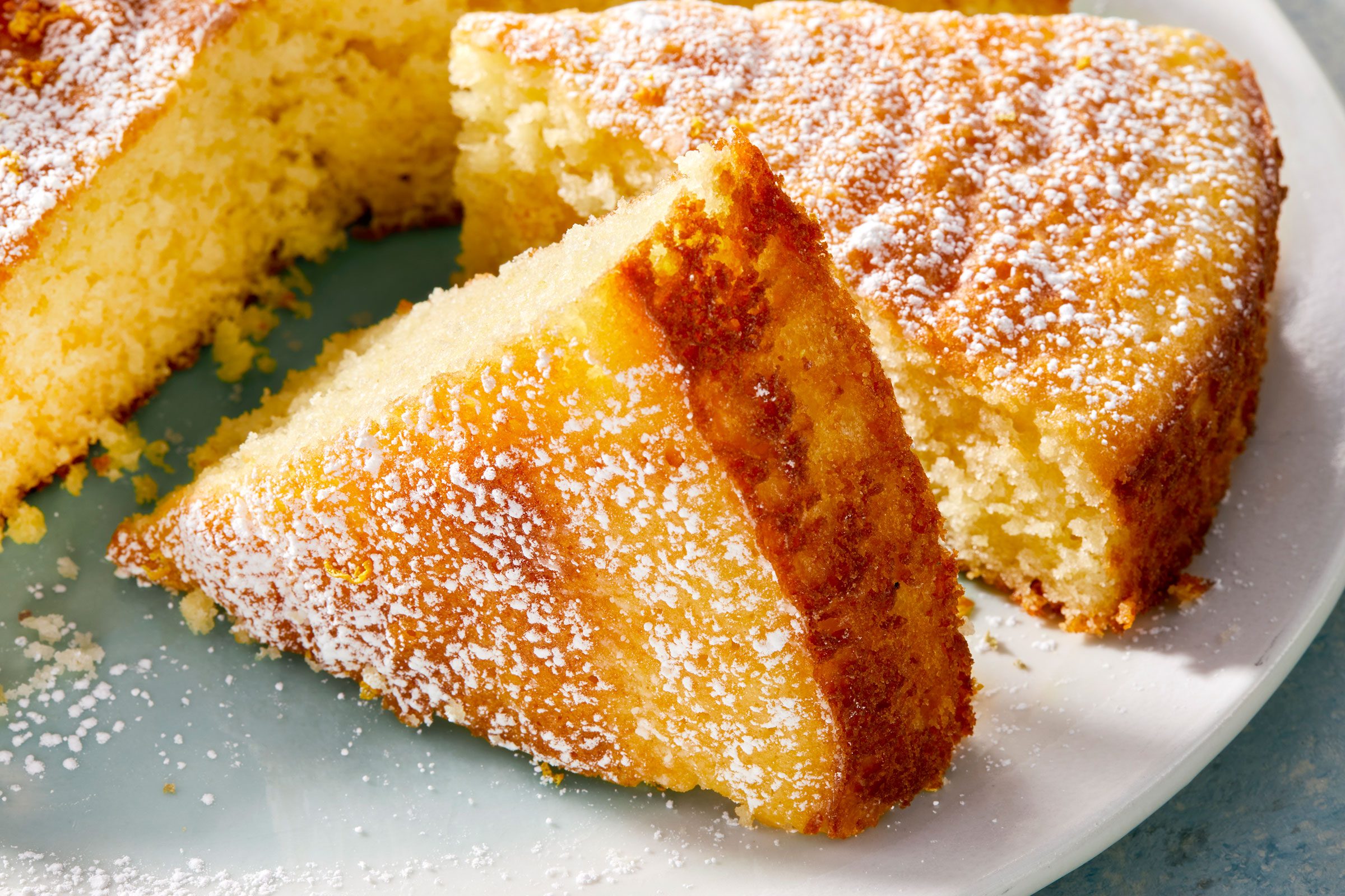 Lemon Olive Oil Cake Bake cut into wedges