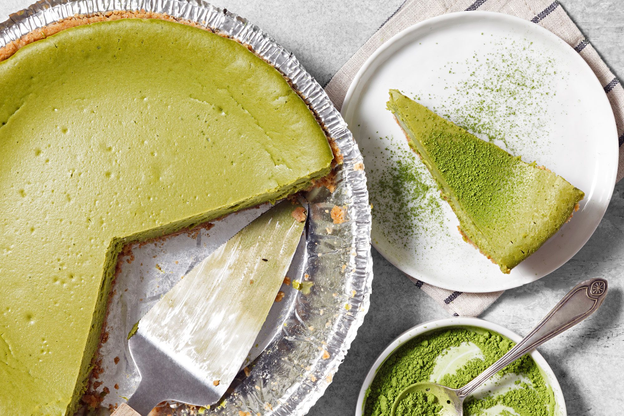 Matcha Cheesecake slice and served in a plate