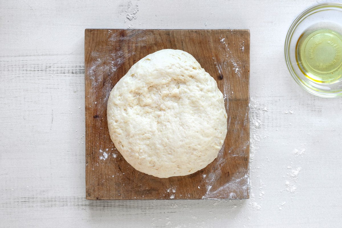 dough on wooden slab