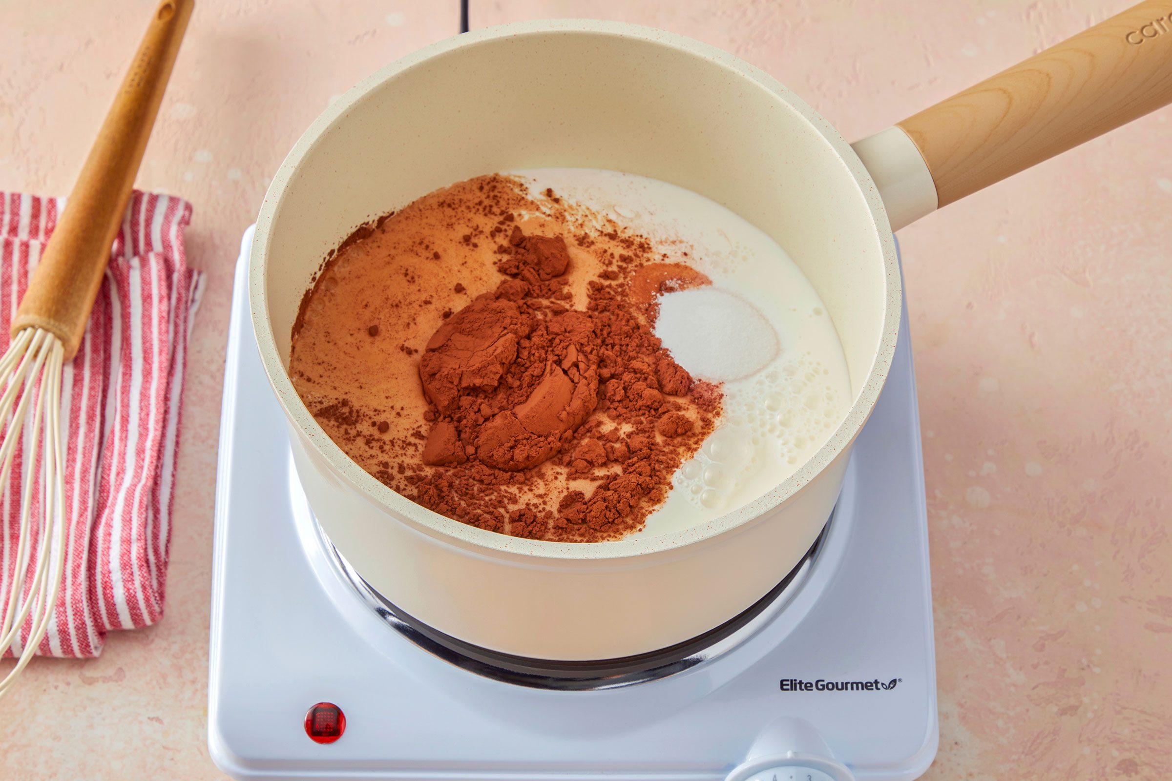 Milk, cocoa powder and sugar in a pan