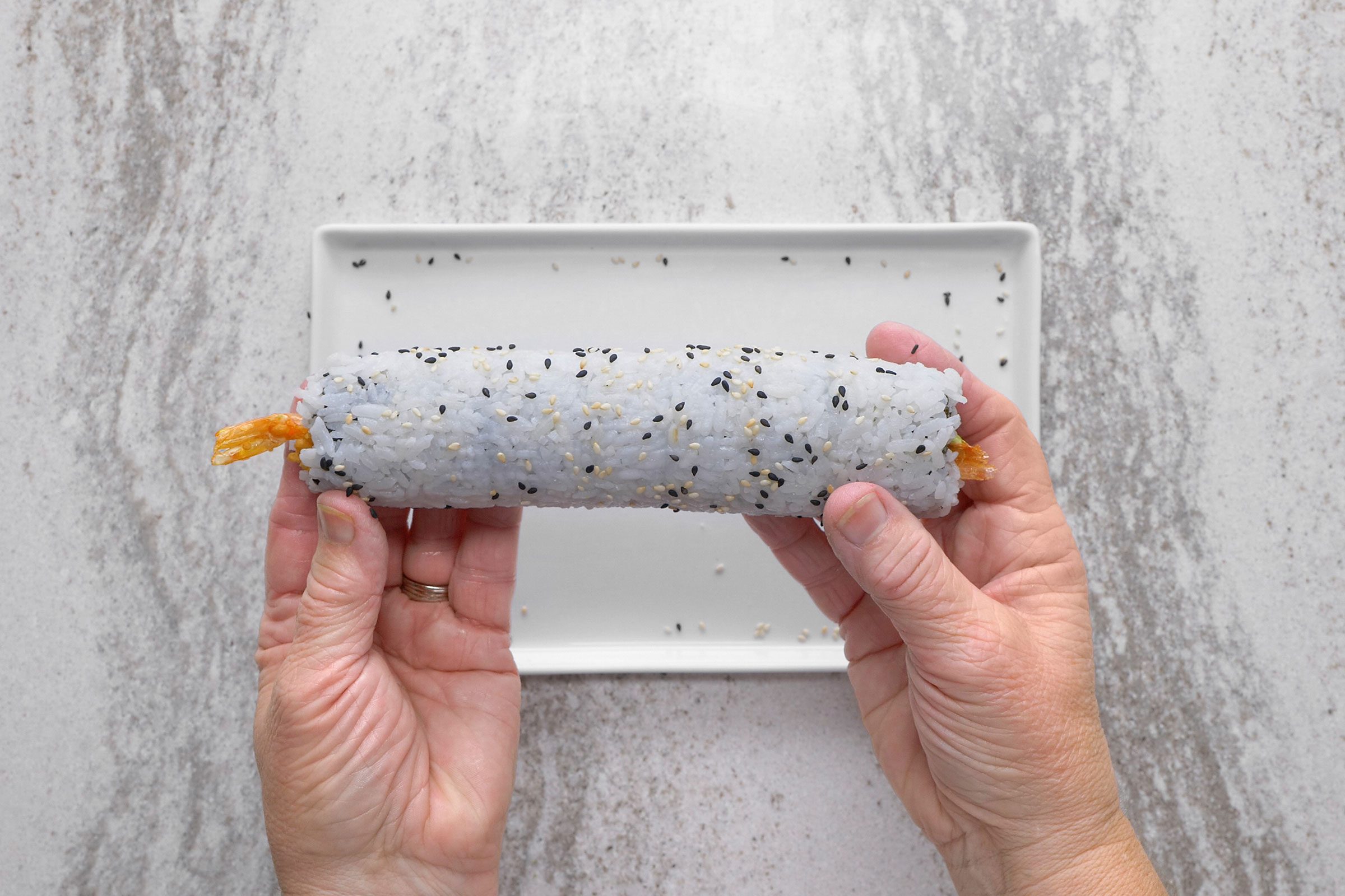 Shrimp Tempura Roll with sesame seeds on it