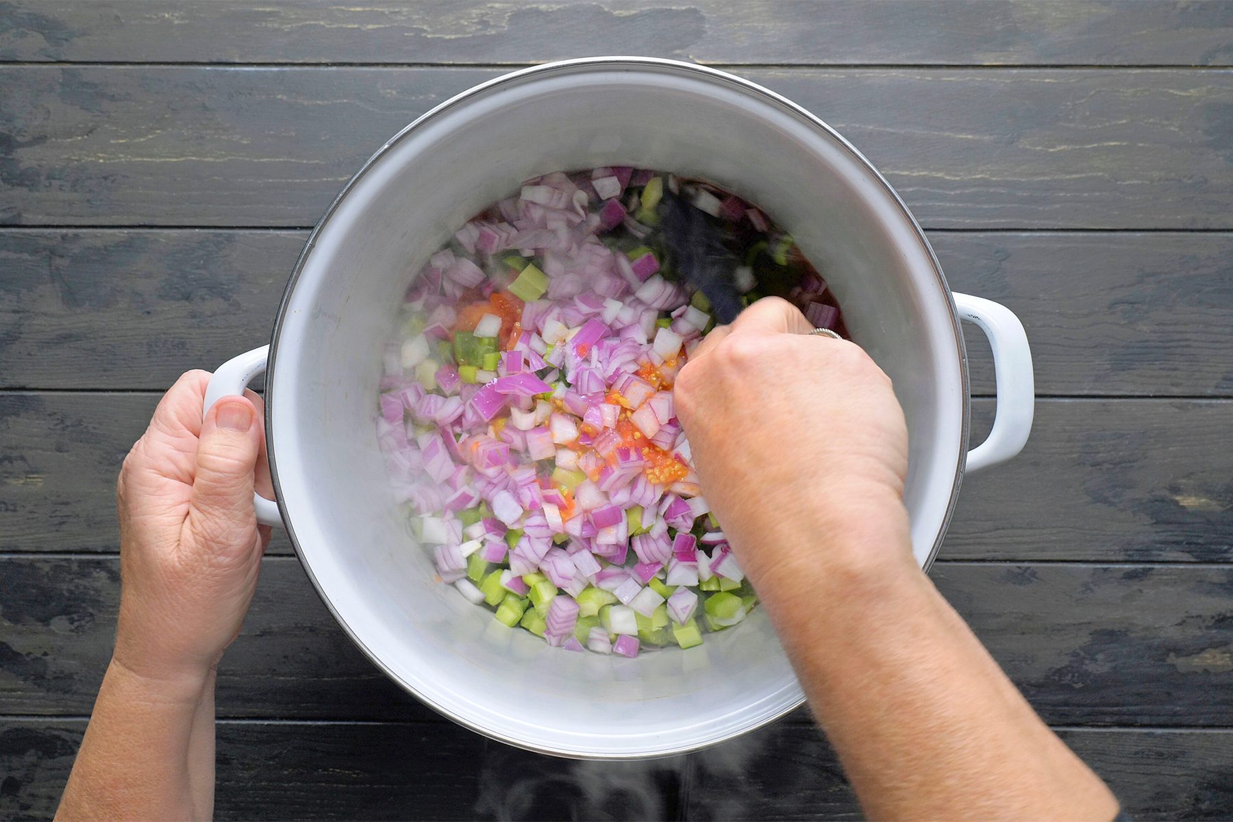 Place tomatoes back in the stock pot. Add green pepper and if desired, celery and onion.