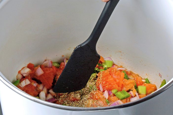 Stir in salt, sugar and if desired, oregano and basil.