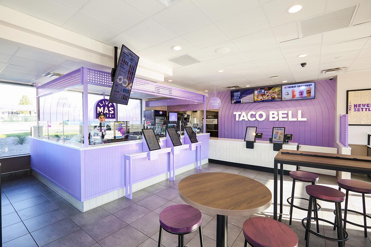 The Live Mas Cafe inside a Taco Bell with order screens and a coffee bar