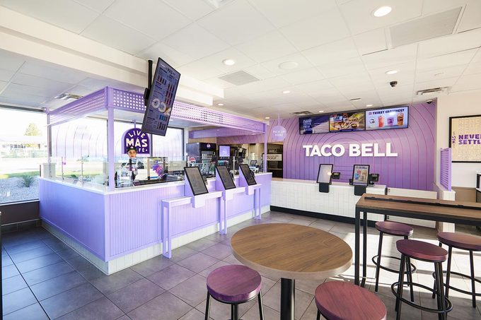 The Live Mas Cafe inside a Taco Bell with order screens and a coffee bar