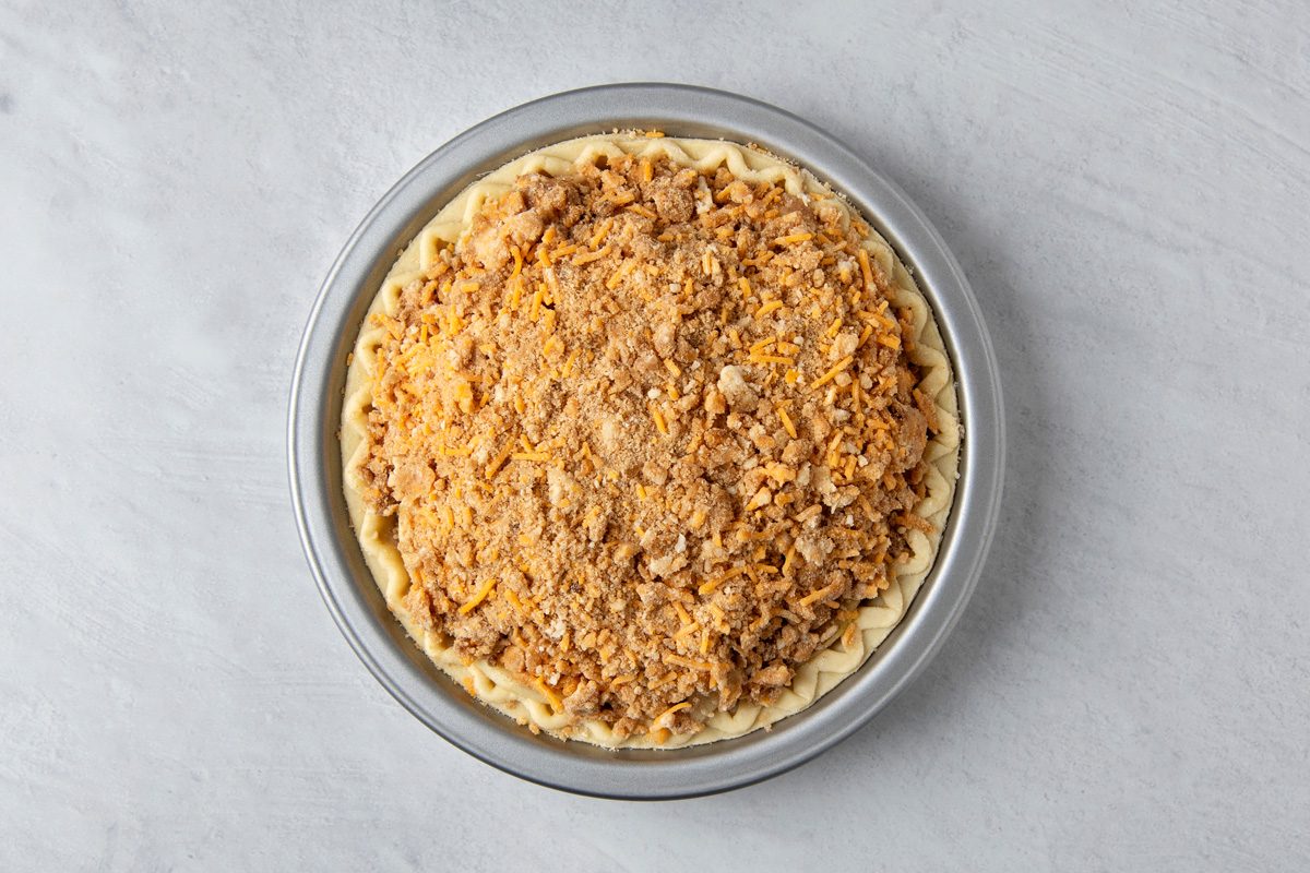 apple pie filling mixture on prepared pie crust