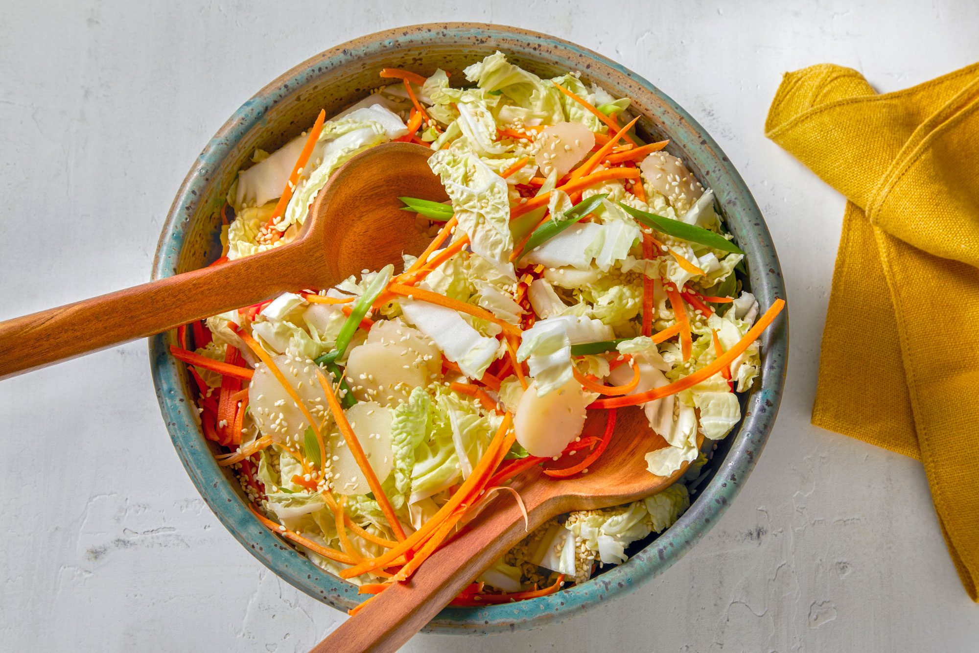 Toss all vegetables and sesame seeds to combine