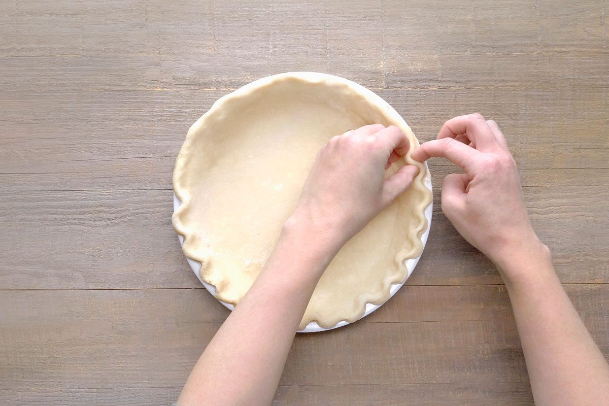 transfer dough to a pie plate. Trim to beyond rim of plate
