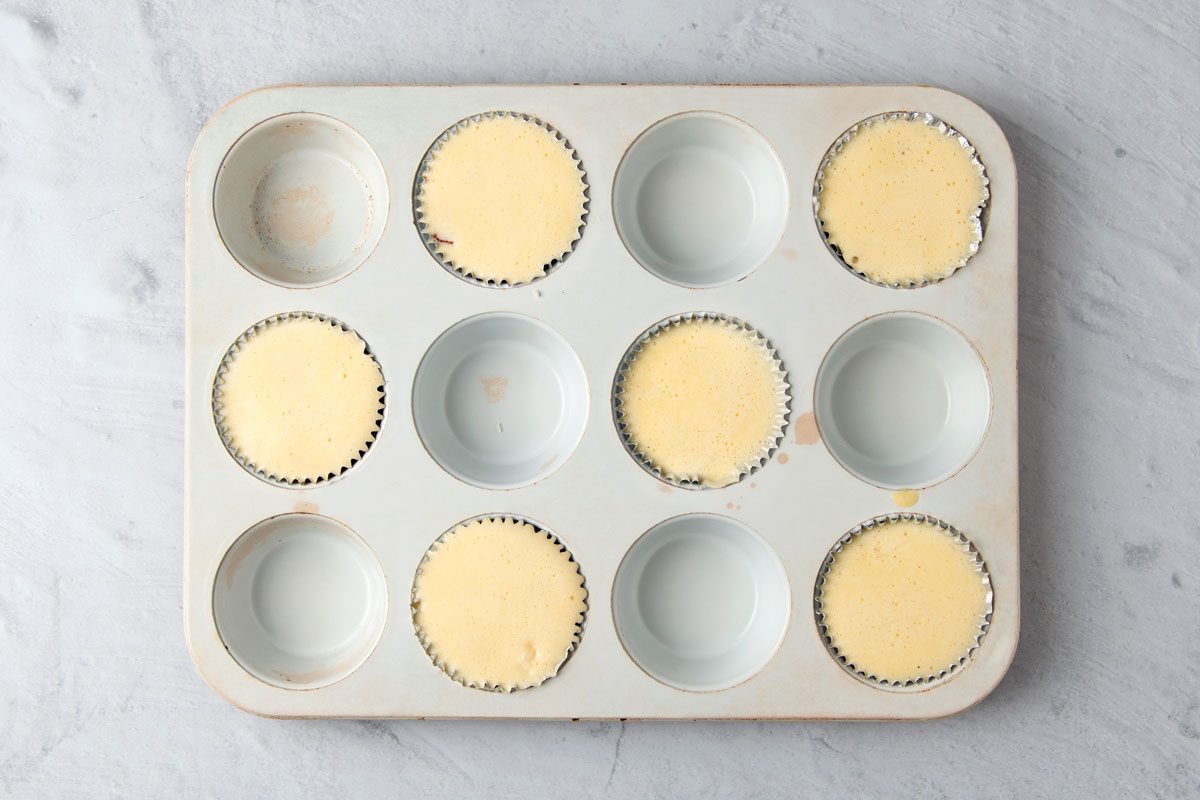 Bake until the eggs puff and are cooked to desired degree of doneness,