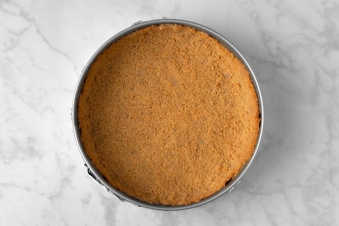 graham cracker crumbs, sugar and melted butter combined