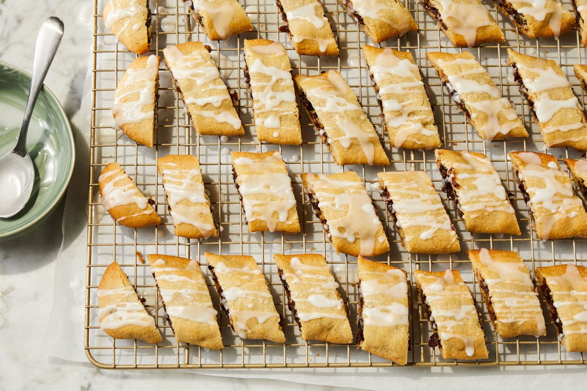 Remove to wire racks to cool. Combine glaze ingredients; drizzle over cookies.