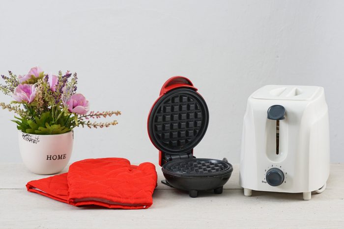 toaster and red glove baker