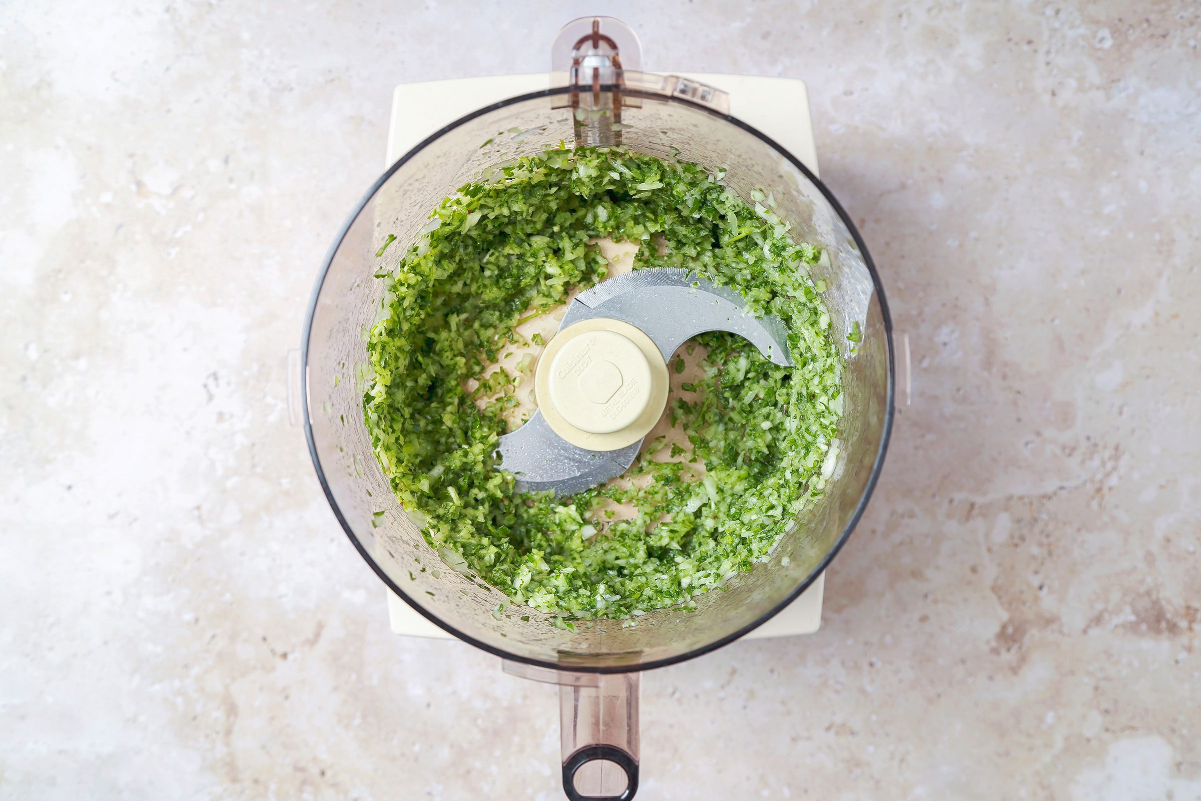 Herbs mixture in a food processor