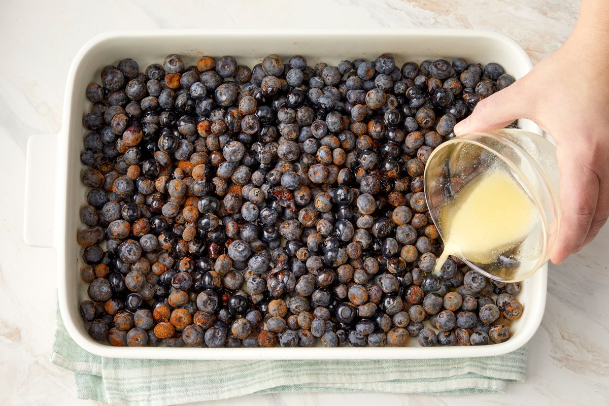 Drizzle with half the melted butter.