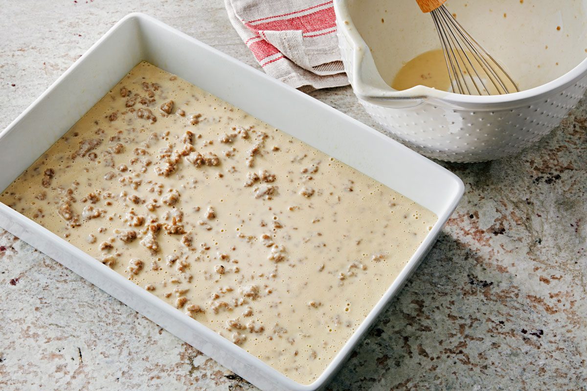 Transfer biscuit mixture to a greased 13x9 inch baking dish