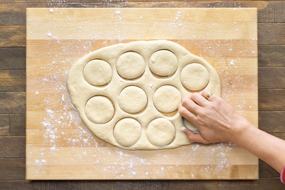 half inch thick dough portion cut with a floured biscuit cutter