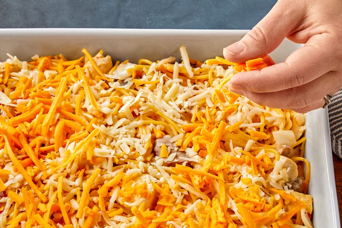 Uncover; sprinkle with remaining cheeses.