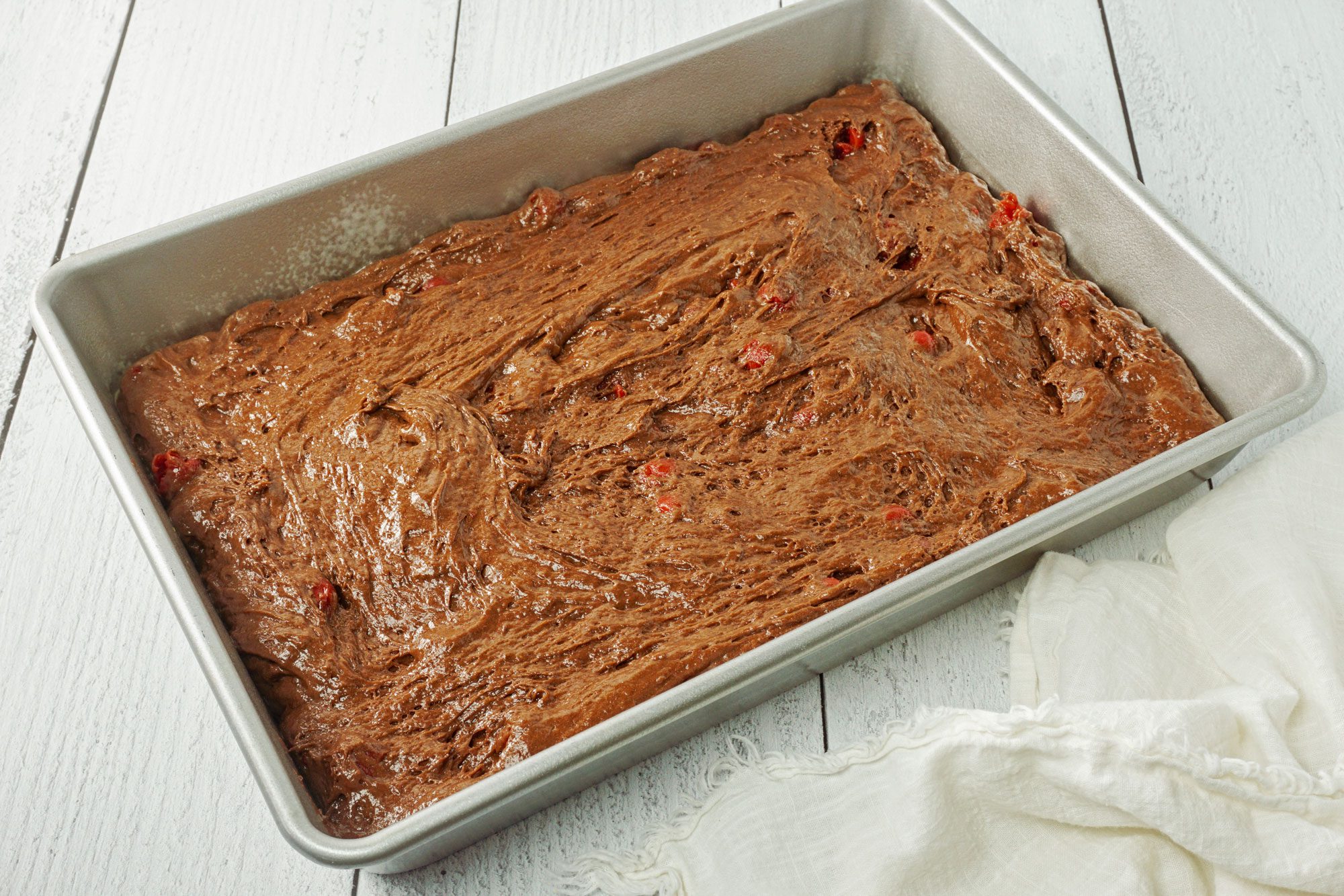 Transfer into a greased 13x9-inch cake pan