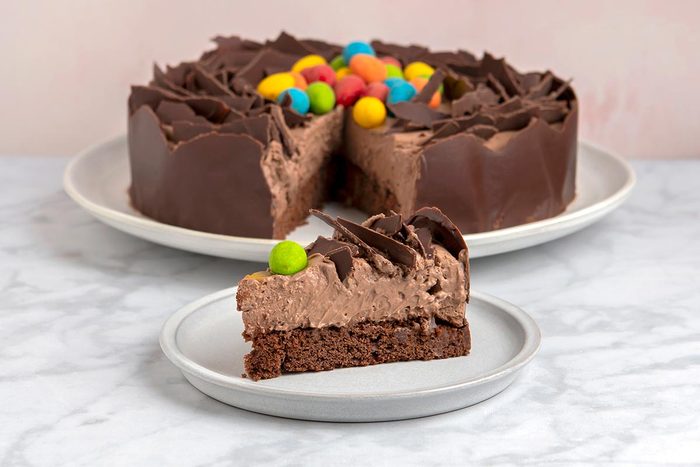 A slice of easter nest torte with candy eggs