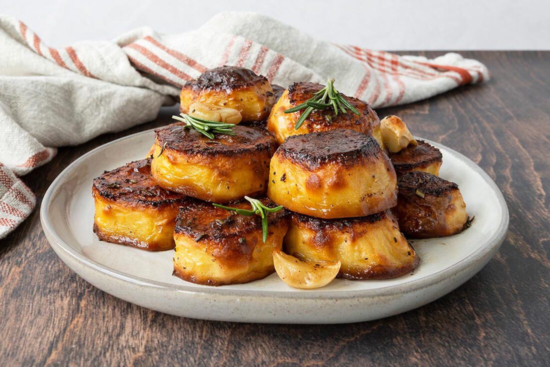 fondant potatoes served on a plate