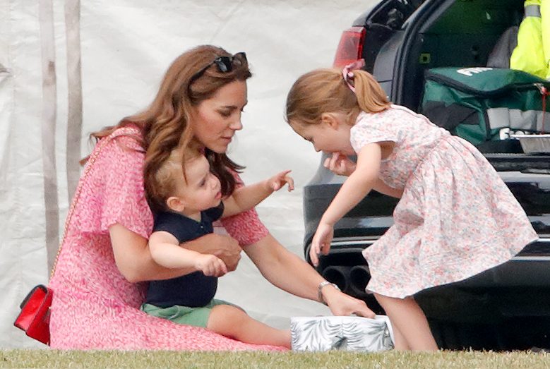 Kate, Duchess of Cambridge, Prince Louis, and Princess Charlotte have a picnic next to their car