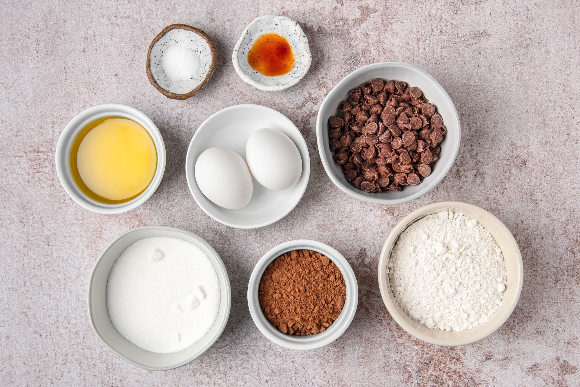 Overhead shot of all ingredients; light brown marble surface