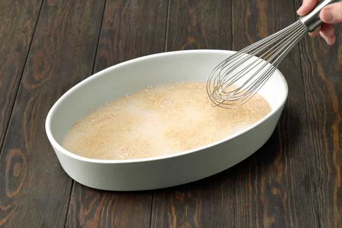 Sugar, yeast and warm water in a large bowl