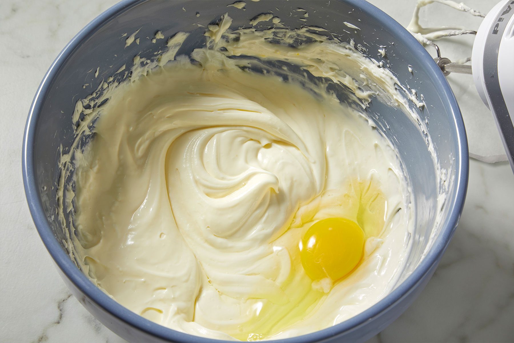 Making cheesecake filling for Strawberry Cheesecake Bars 