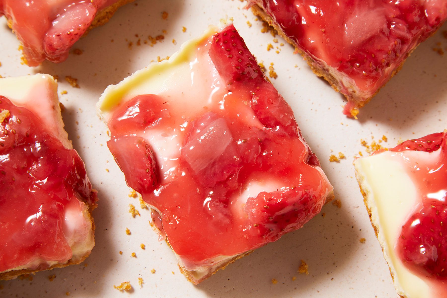 Strawberry Cheesecake Bars served on a plate