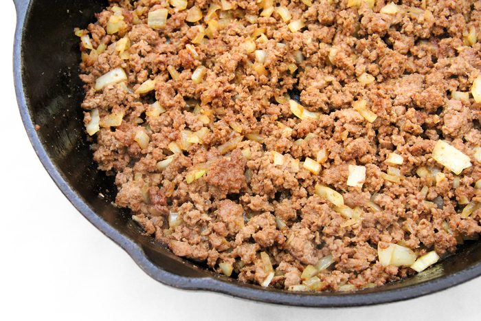 Close up shot of beef cooked in skillet