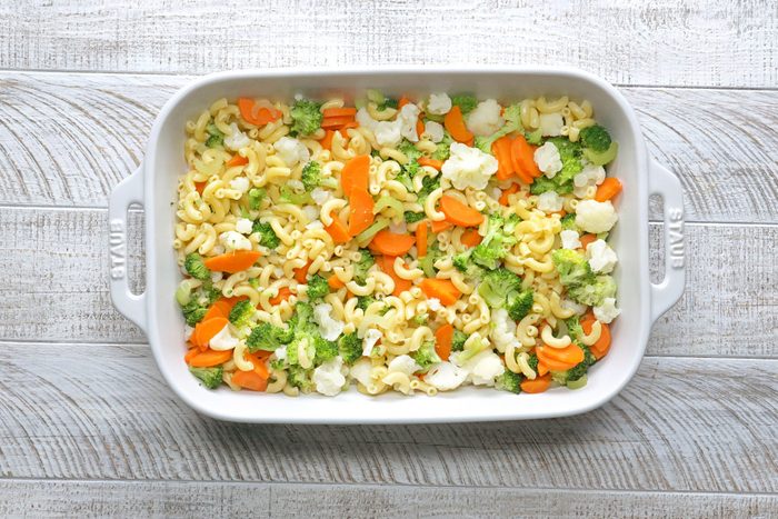 drained pasta and vegetables transferred to a greased 13x9-inch baking dish.