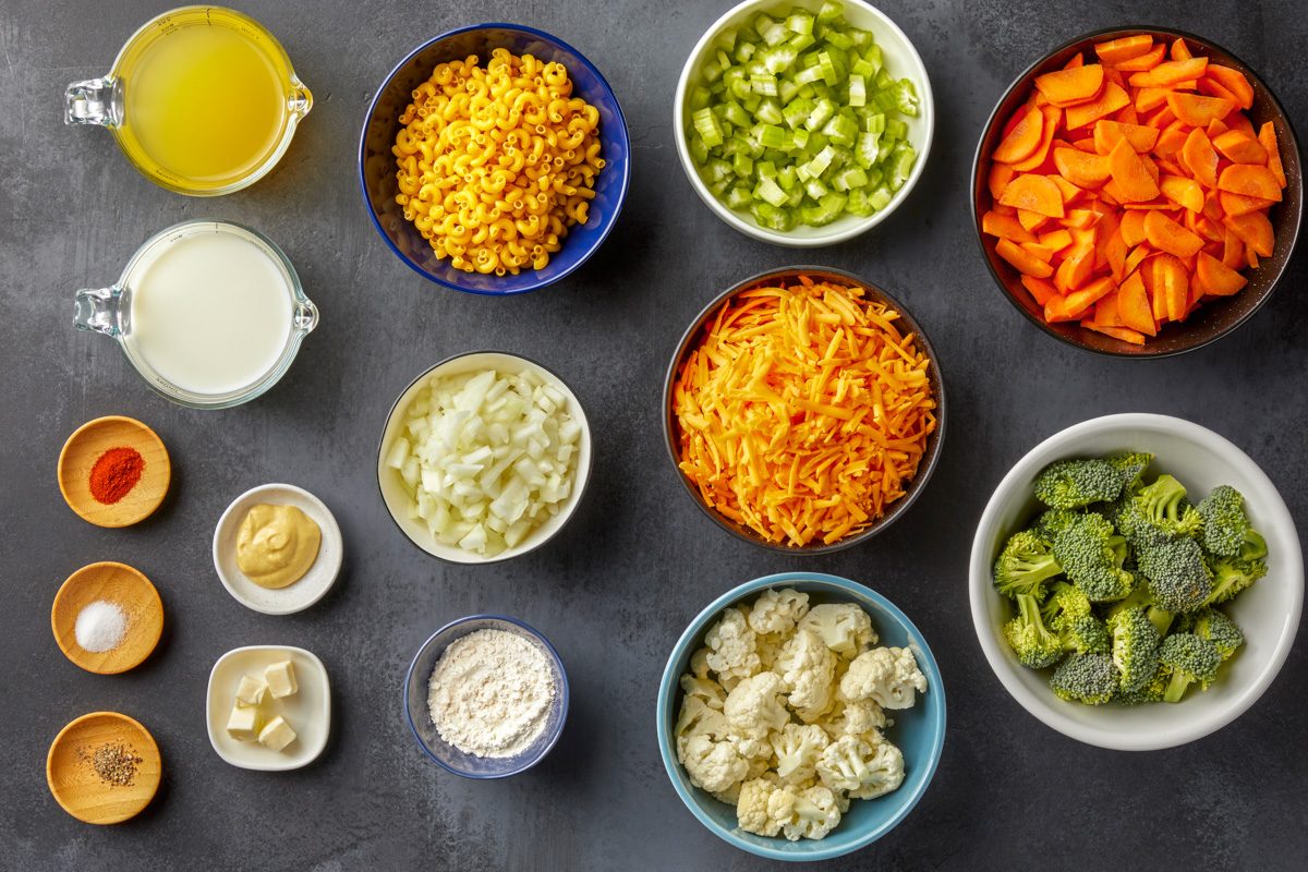 Cauliflower, carrots, celery, butter, broccoli, macaroni, onion, flour, milk, mustard, chicken broth, cheddar cheese and seasonings