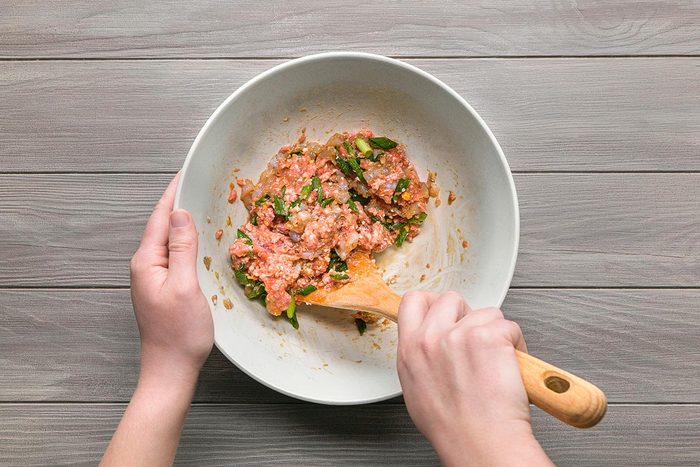 Wonton Soup filling ingredients being combined in a bowl