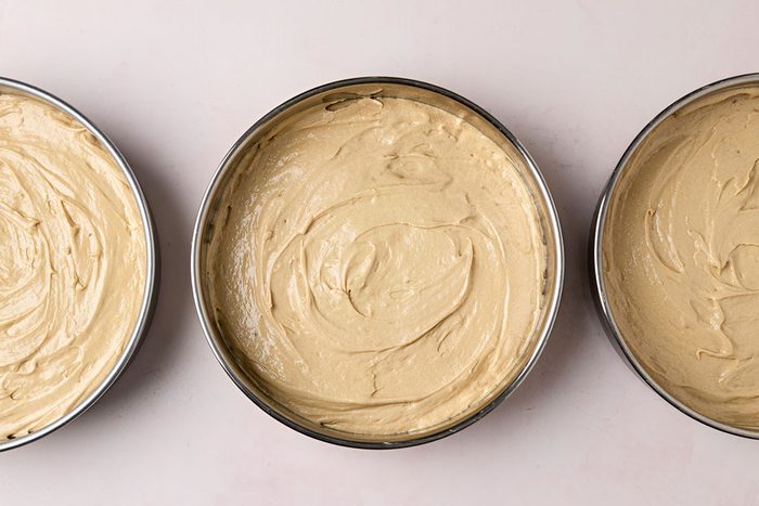 Batter among the three prepared pans.